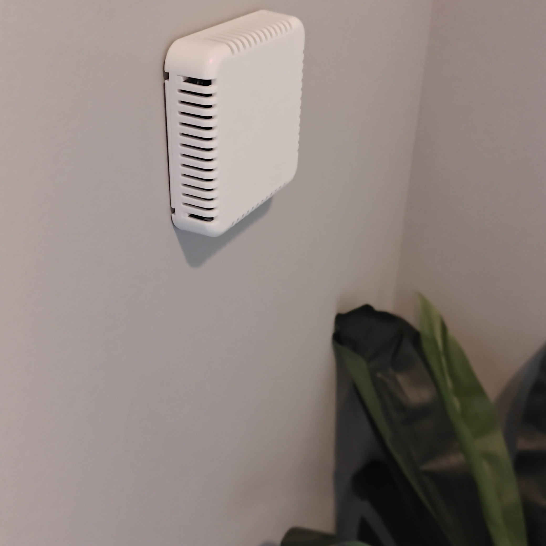 Wall-mounted CO2-based demand controlled ventilation controller in a bedroom
